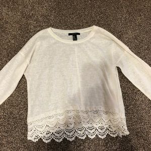 shear sweater with lace at the bottom